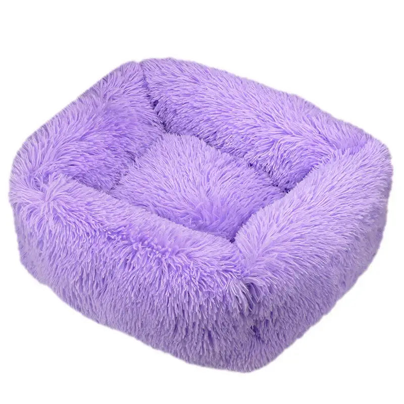 Fluffy, square-shaped purple pet bed with raised edges.