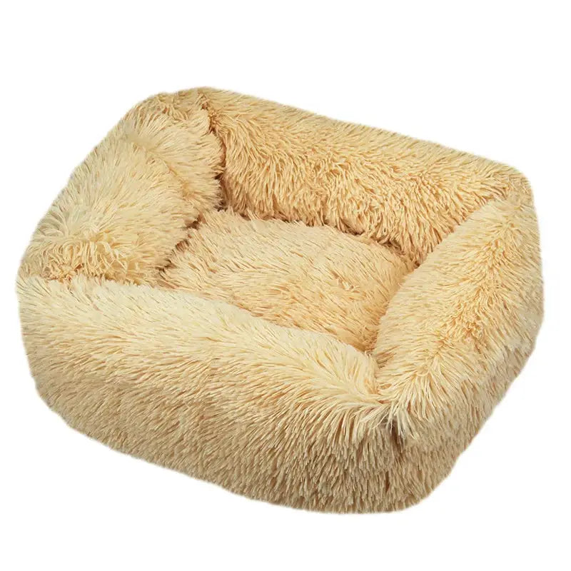 Plush, square-shaped pet bed with fluffy beige fur lining.