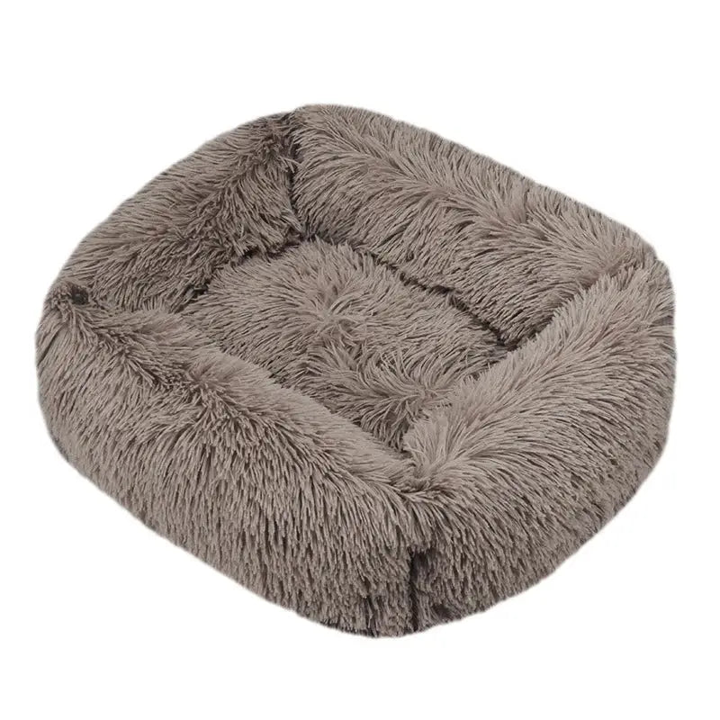 Plush, square-shaped pet bed with fluffy gray fur-like material.