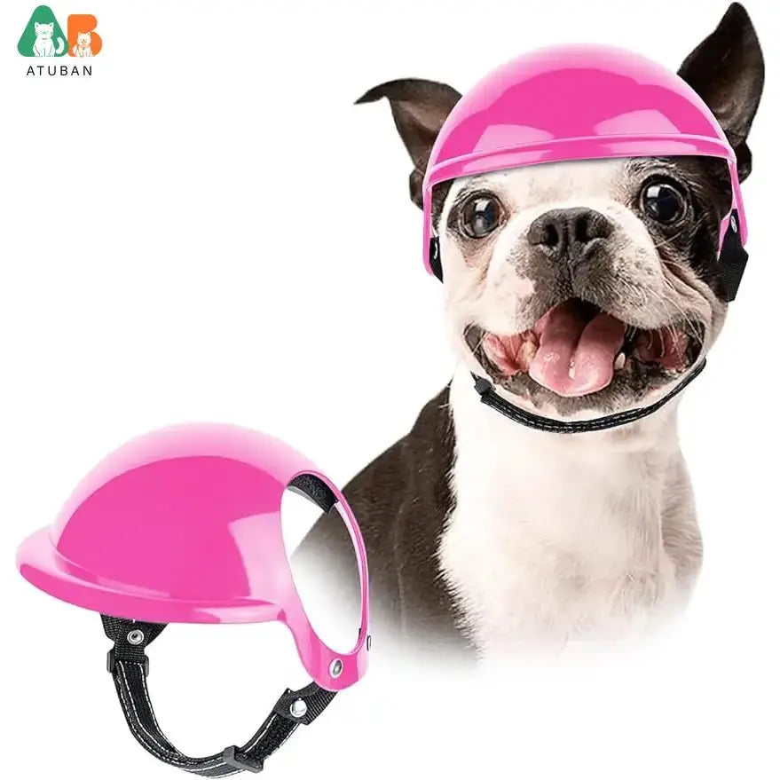 Bright pink dog helmet with adjustable chin strap.