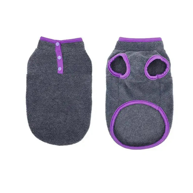 Dog sweater or vest in gray with purple trim and button accents.