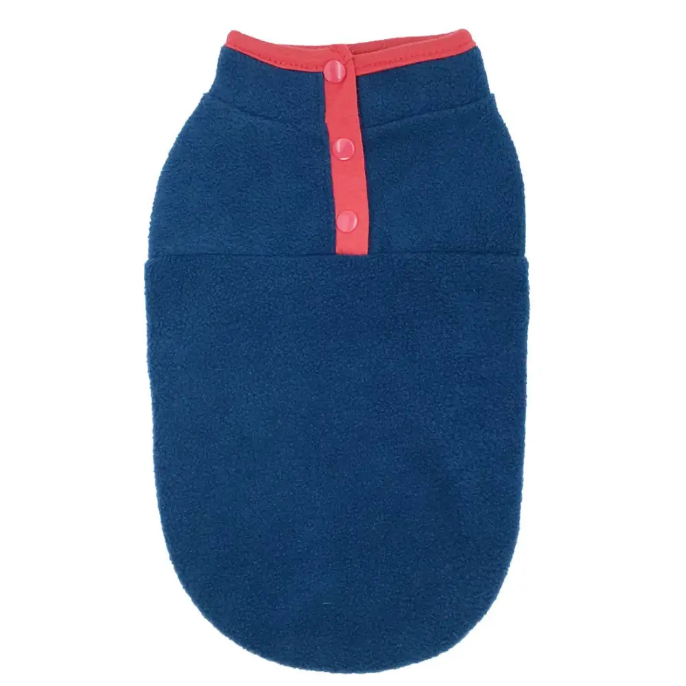 Navy blue dog sweater with a red collar and button placket.