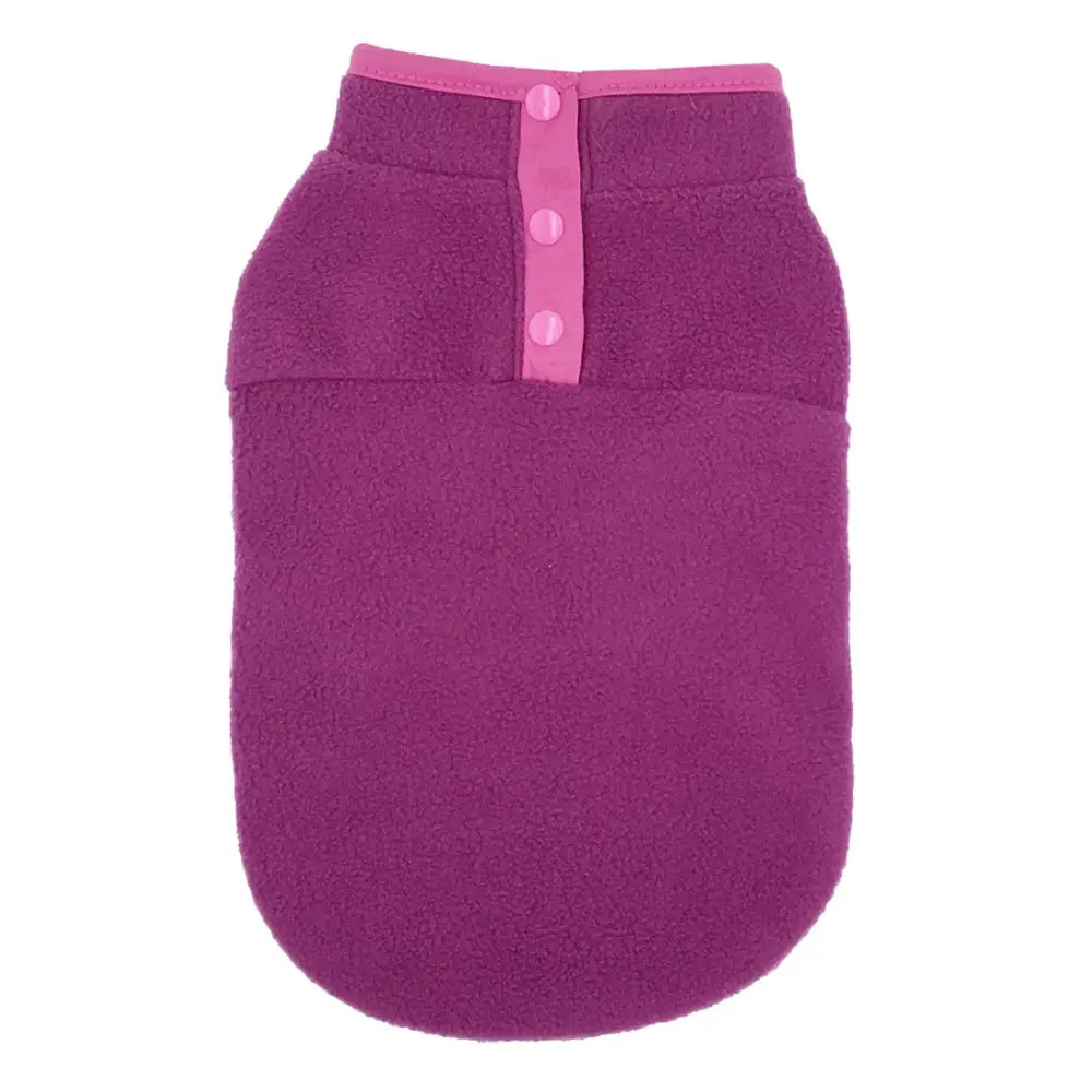 Purple fleece dog vest with pink button placket.