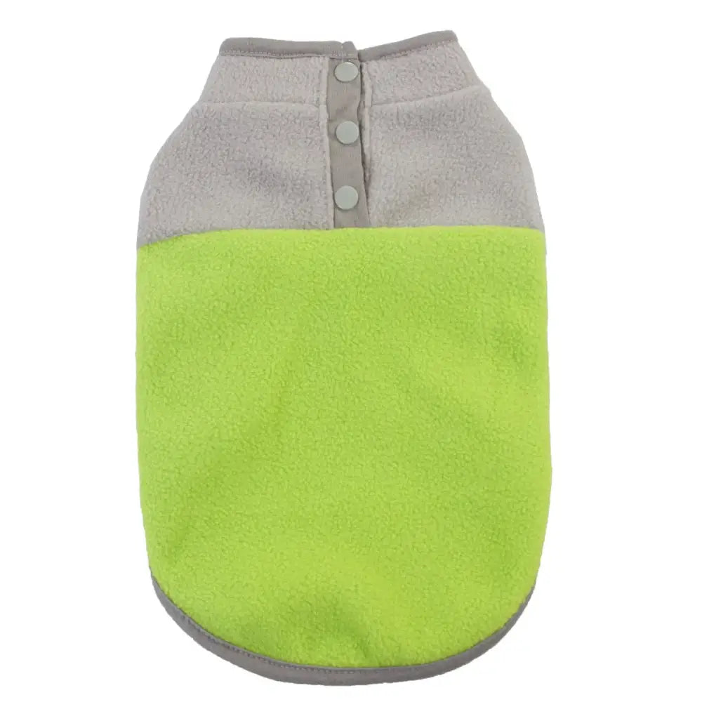 Two-toned dog vest with gray top and bright green bottom, featuring buttons along the neckline.