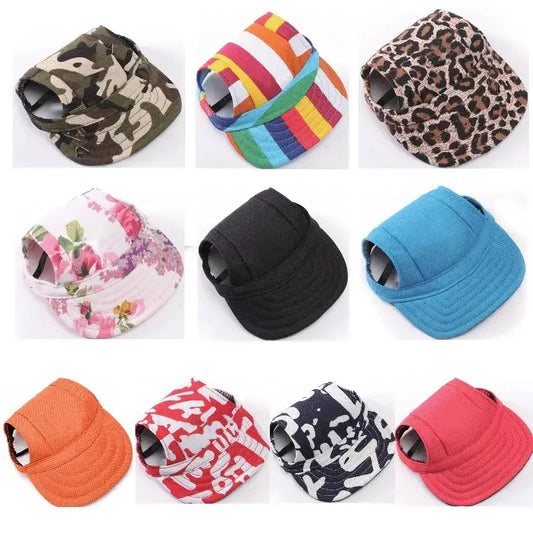 Collection of colorful pet caps or hats in various patterns and designs.