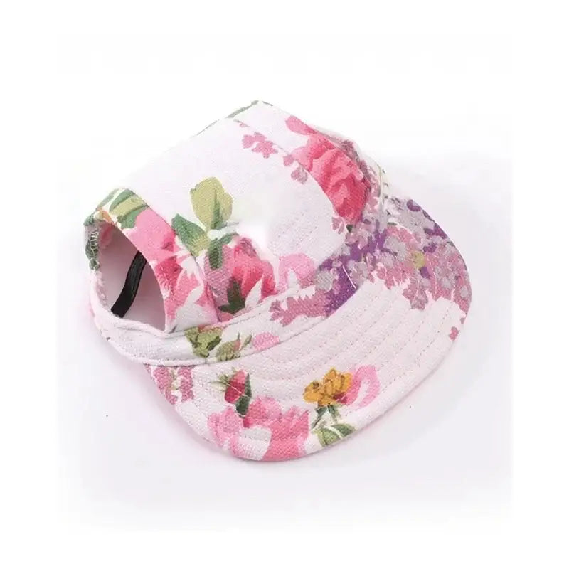 Floral-patterned baseball cap with a pink and white color scheme.