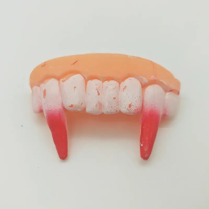 Set of fake vampire teeth with elongated canines.