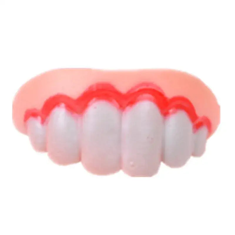 Set of novelty fake teeth with exaggerated gums.