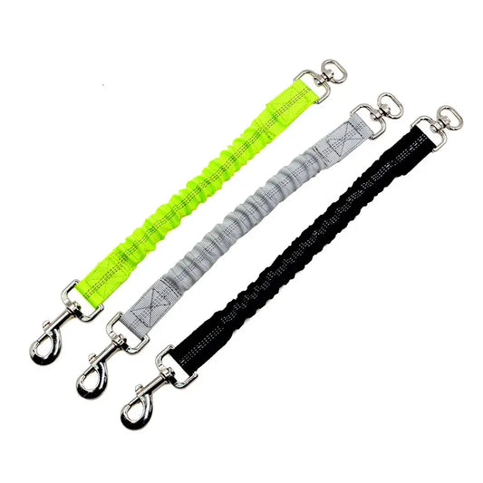 Elastic bungee cords in neon green, gray, and black with metal hooks at each end.