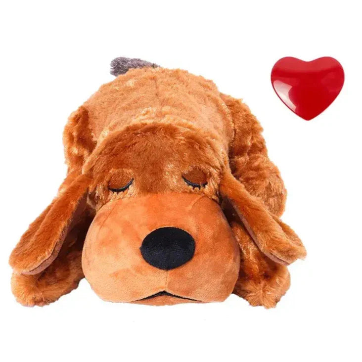 Plush toy dog with floppy ears and a brown coat.