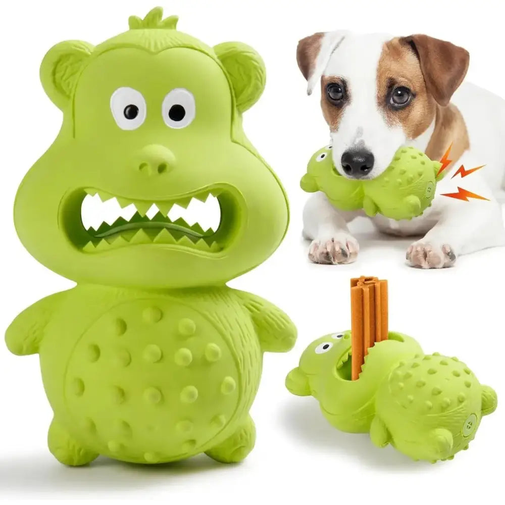 Green rubber dog toy shaped like a cartoon monster with big eyes and teeth.