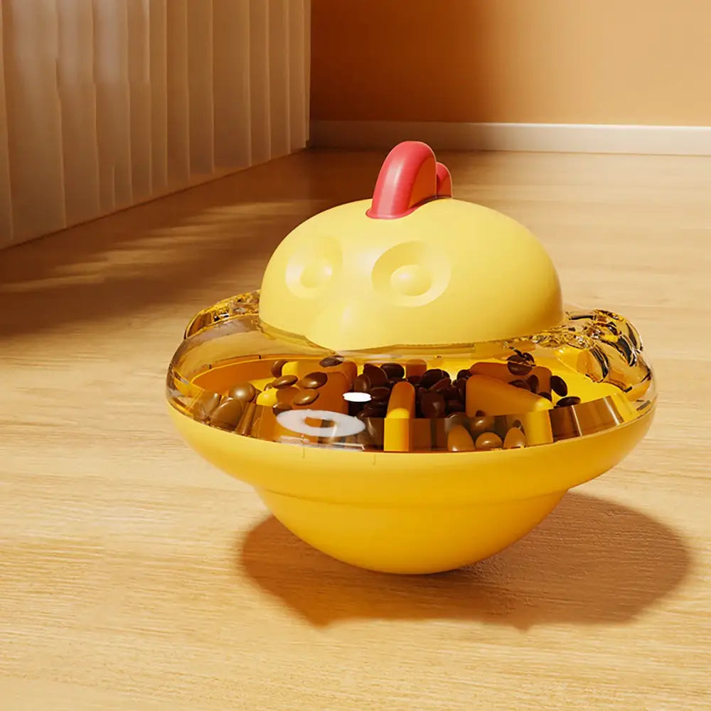 Yellow plastic toy container shaped like a hamburger, filled with small toy pieces.