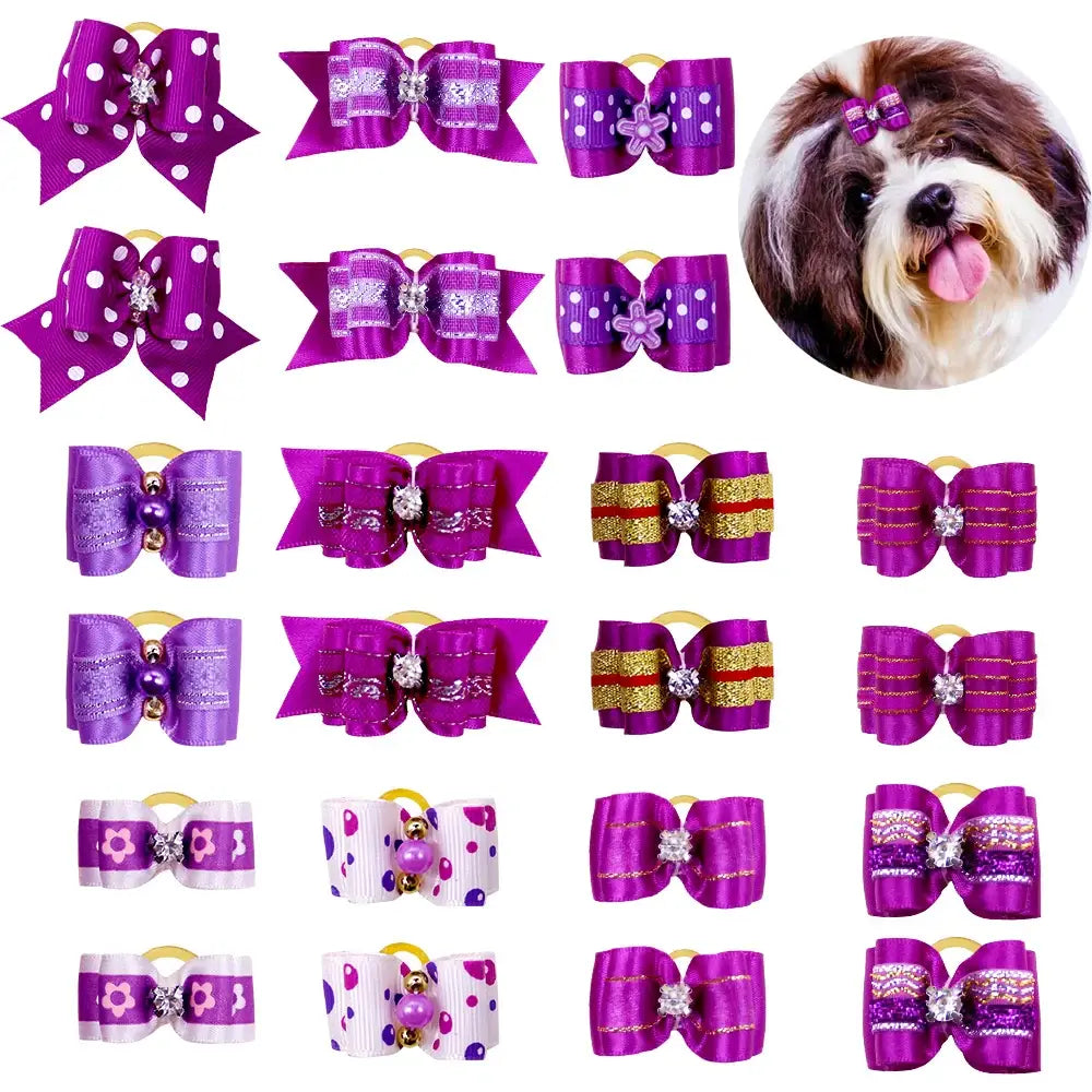 Collection of colorful dog hair bows and accessories featuring a dog’s face.