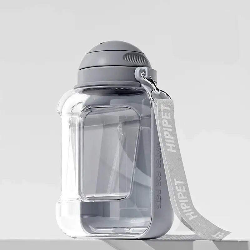 Clear plastic water bottle with a gray lid and attached strap.