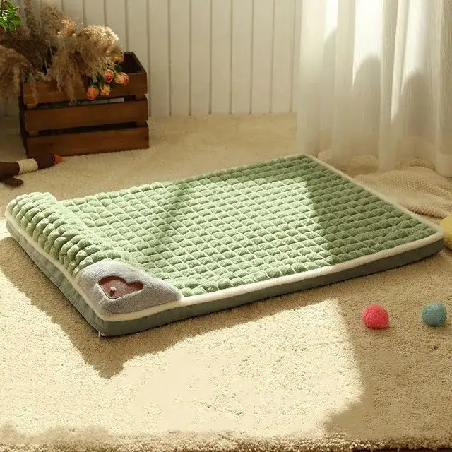 Mint green pet bed with a textured, quilted surface and a small opening on one side.