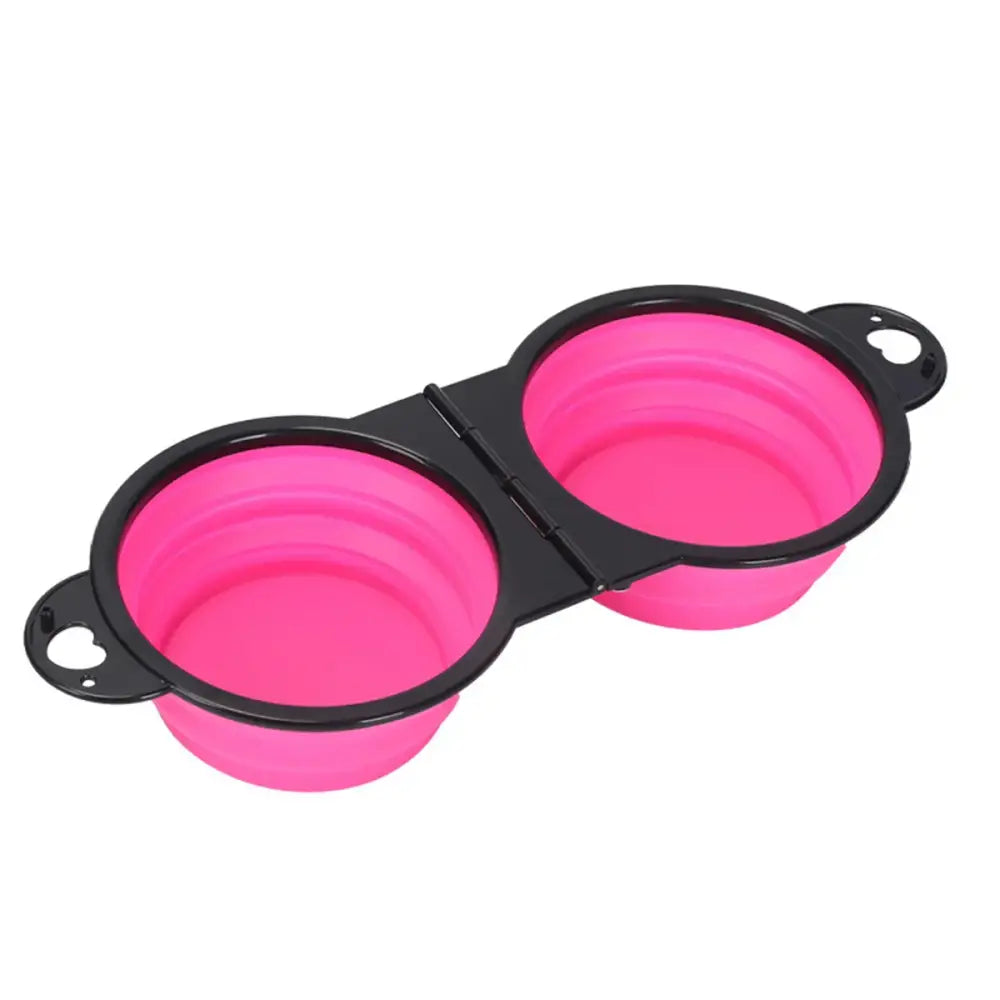 Collapsible pink silicone pet bowls connected by a black frame.