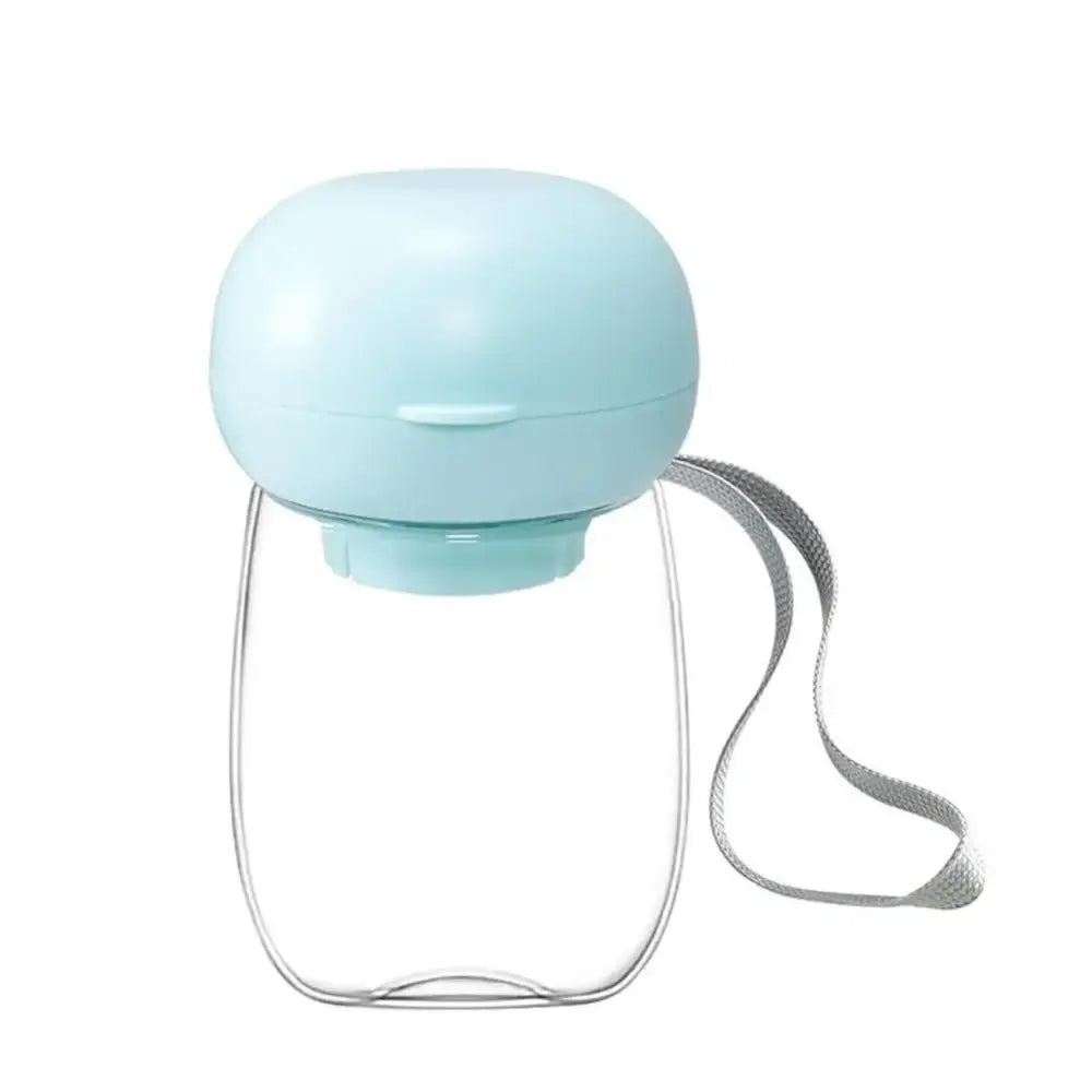 Pale blue portable humidifier with a rounded top and carrying strap.