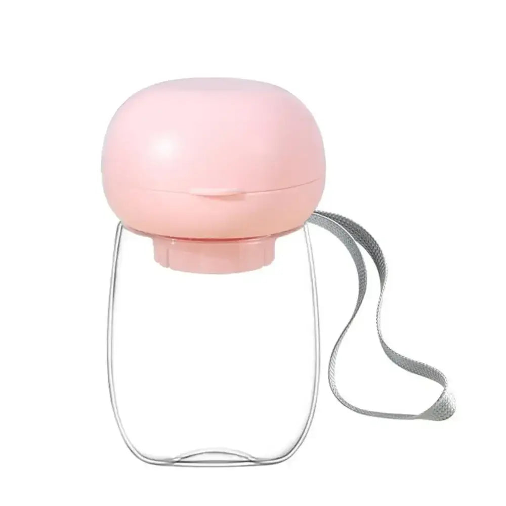 Pink mushroom-shaped portable water bottle with a gray strap.