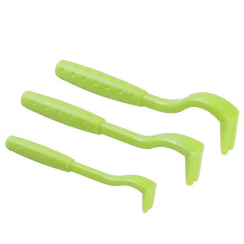 Three lime green plastic tire levers or bike tools.