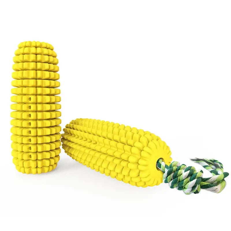 Yellow corn-shaped dog chew toy with a rope attached.