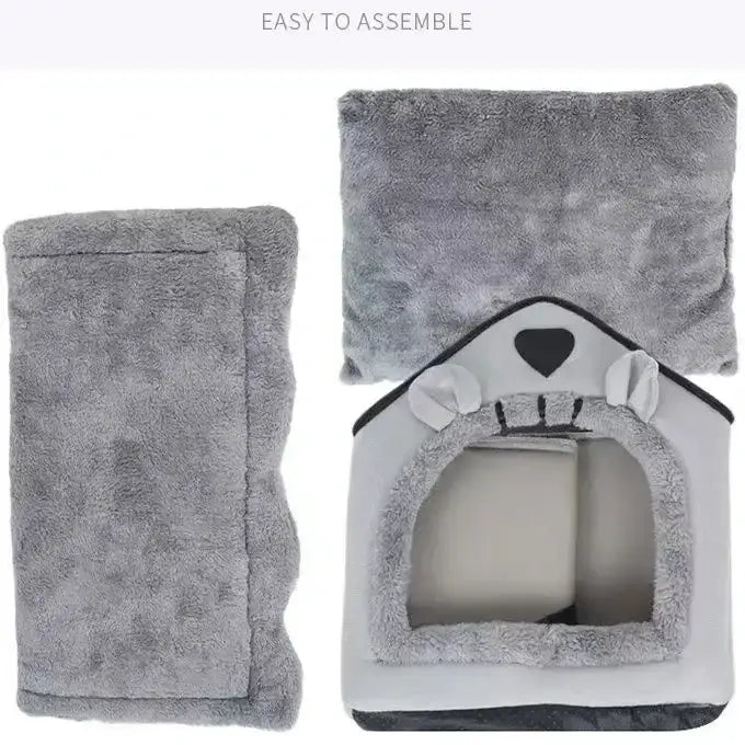 Soft gray pet bed shaped like a house with a cute animal face design.