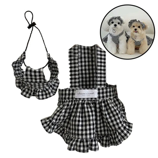 Black and white gingham patterned dog dress with matching collar.