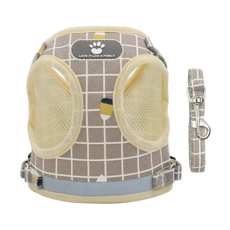 Dog harness with a matching leash in a gray and yellow grid pattern.