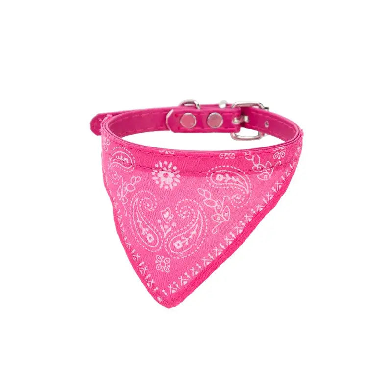 Pink bandana-style dog collar with white paisley pattern.