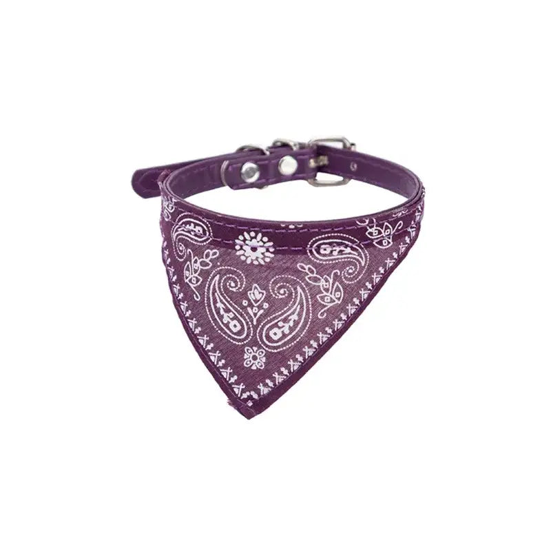 Purple bandana-style dog collar with white paisley pattern.