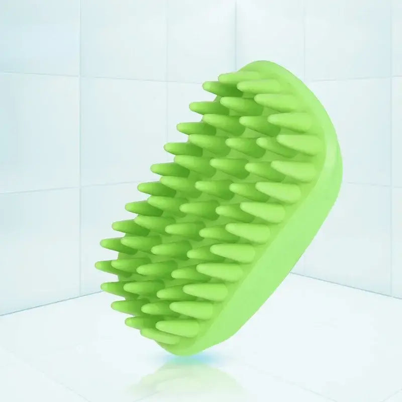 Bright green oval-shaped brush with flexible bristles.