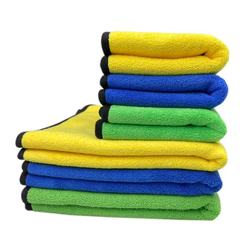 Stack of colorful microfiber cleaning cloths or towels.