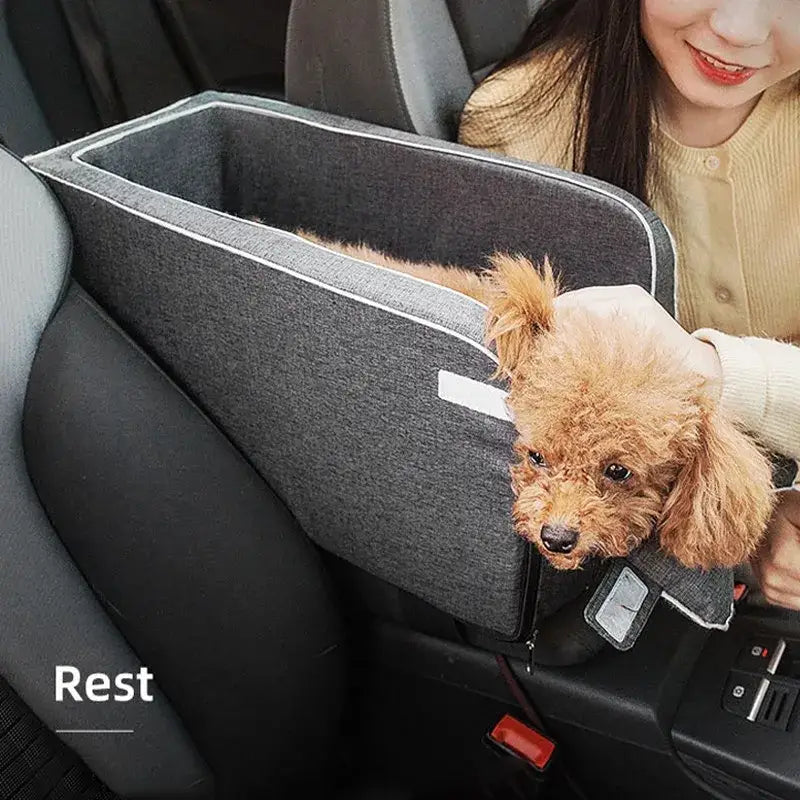 Dog car seat or pet booster for vehicle travel.