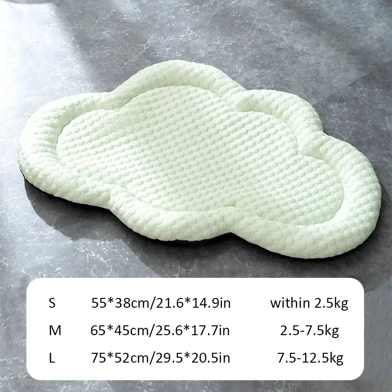 Cloud-shaped white textured mat or cushion.