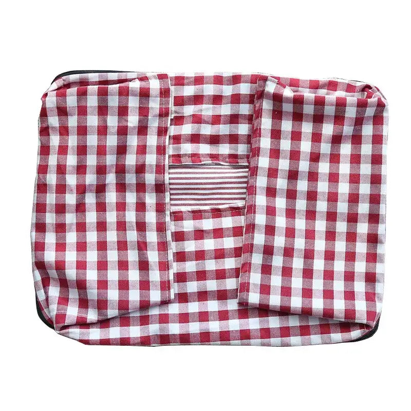 Red and white checkered fabric pouch or bag with a striped pocket.