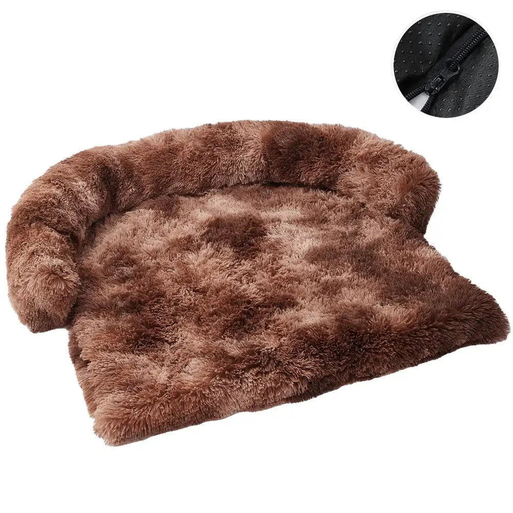 Fluffy brown sheepskin or fur rug with a curled edge.