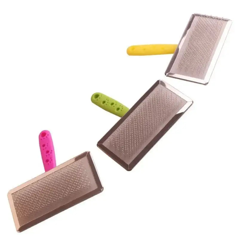 Pet grooming brushes with colorful handles.