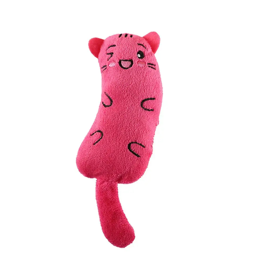 Pink plush cat-shaped toy with a smiling face and curved markings on its body.