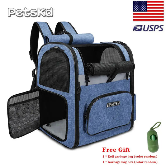 Pet carrier backpack with mesh panels and side pockets in blue denim-like fabric.