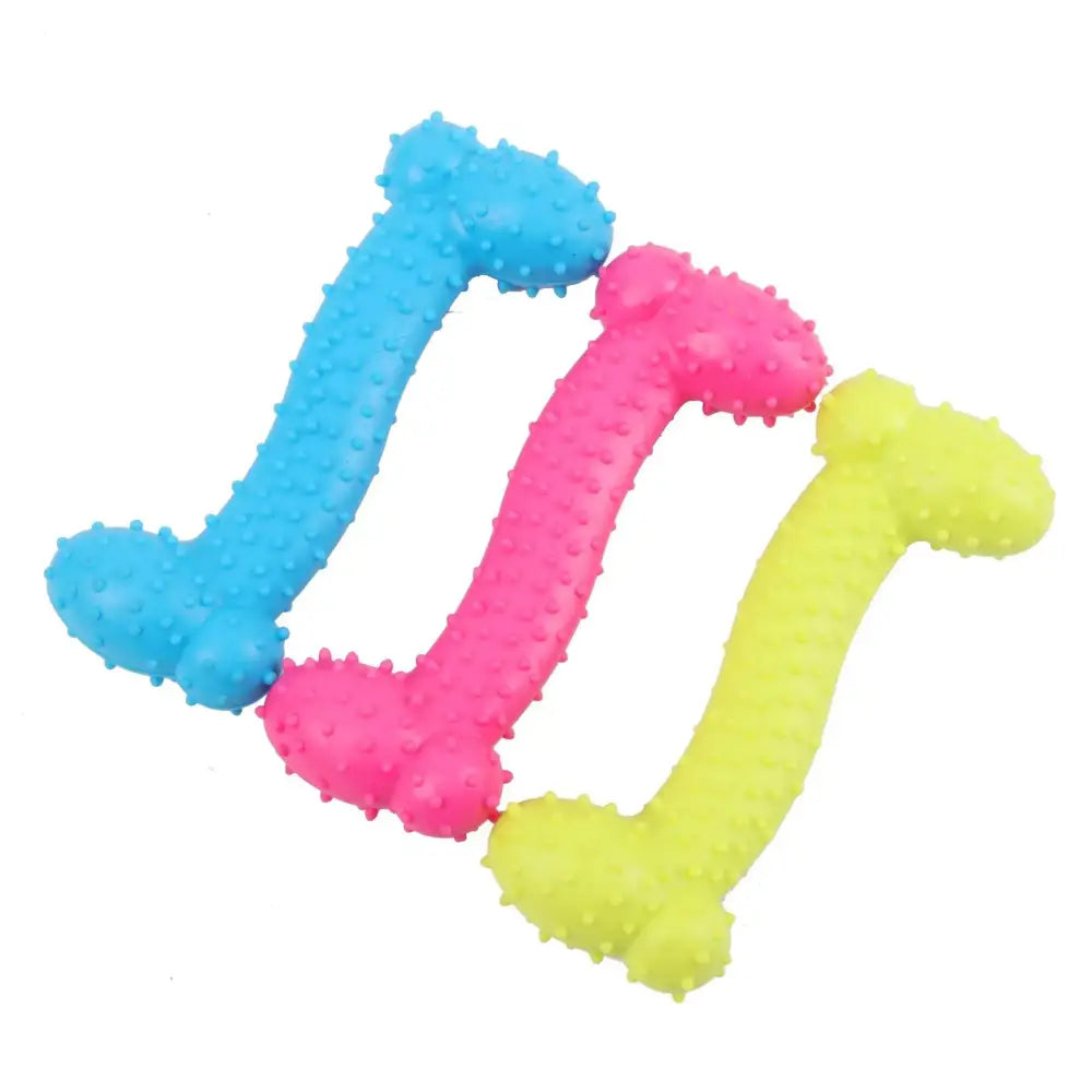 Colorful bone-shaped dog chew toys in blue, pink, and yellow.