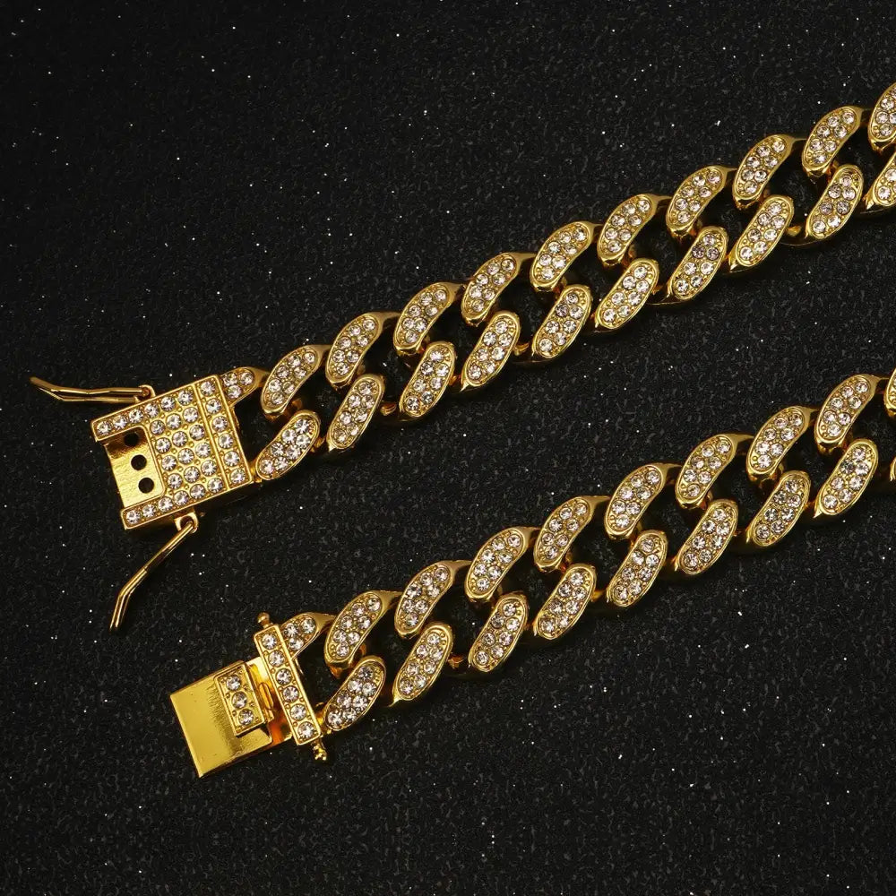 Gold chain necklace with diamond-encrusted links.