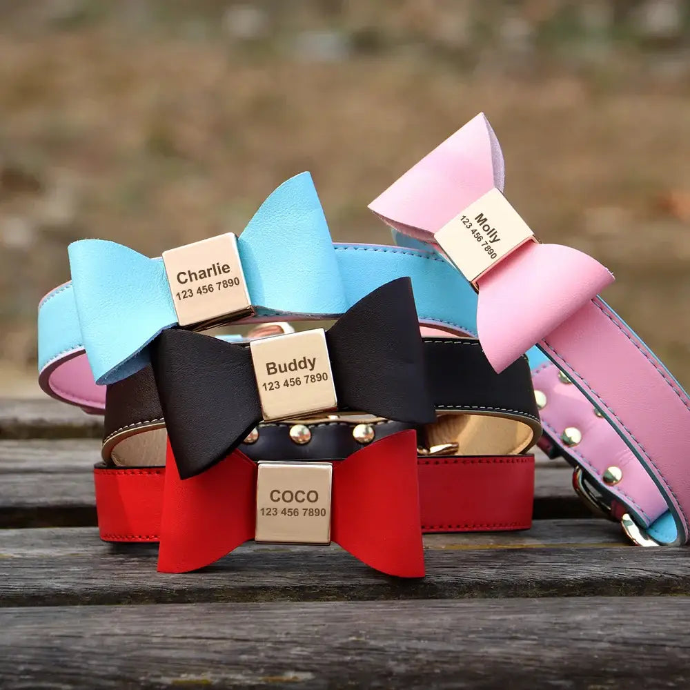 Colorful pet collars with bow ties and personalized name tags.