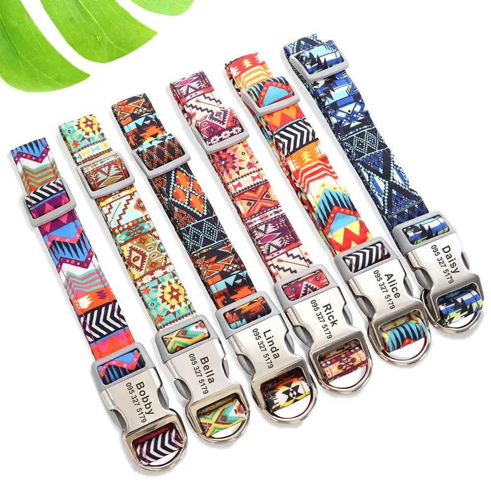 Colorful patterned dog collars with metal buckles arranged in a row.