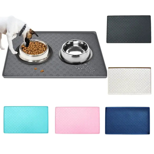 Pet feeding mat with two metal bowls and a dog eating from one bowl.