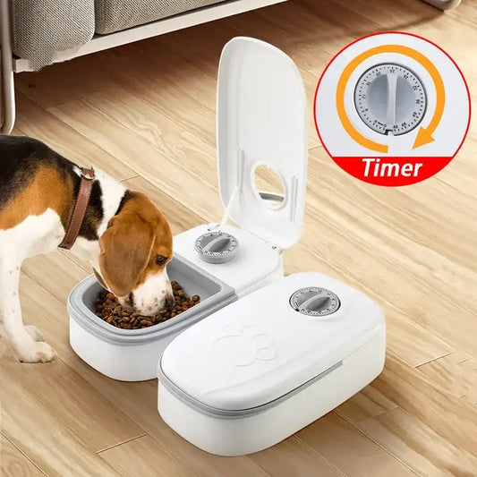 Automatic pet feeder with timer and water dispenser being used by a beagle dog.