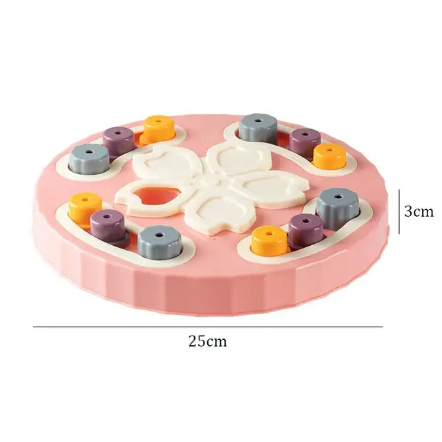 Circular pink puzzle toy with colorful wooden pieces and a flower-shaped center.