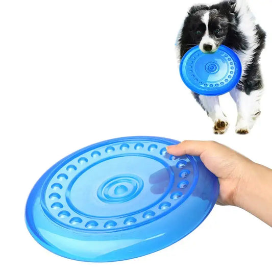 Blue plastic flying disc dog toy with circular ridges and holes.