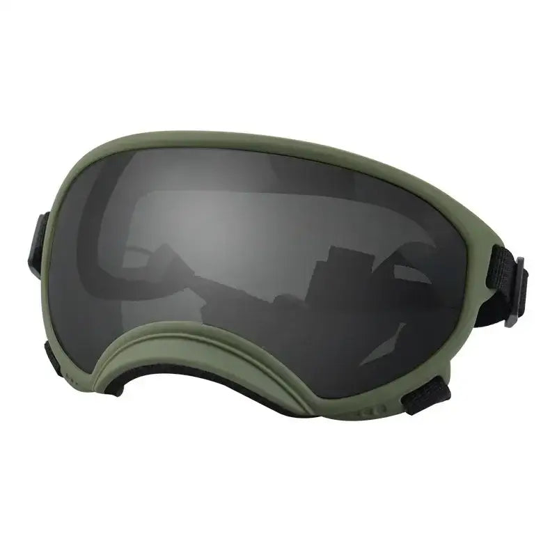 Military-style protective goggles with a dark tinted lens and olive green frame.