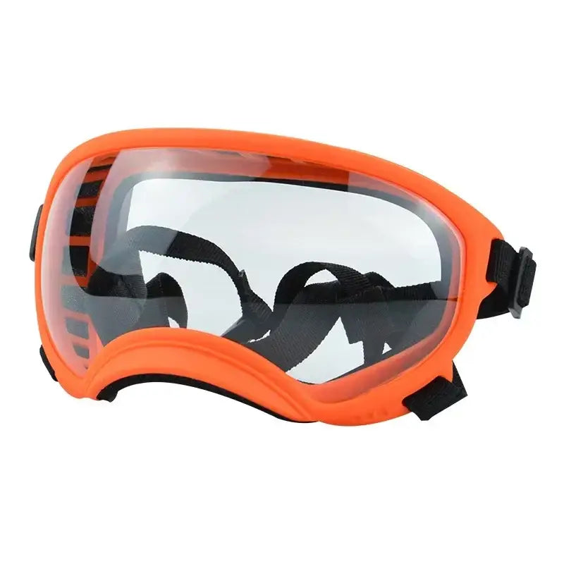 Orange-framed safety goggles with clear lenses and an adjustable strap.