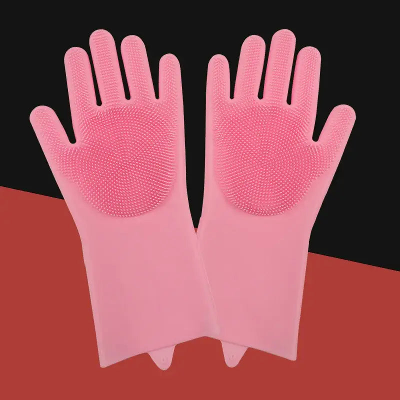 Pair of pink silicone cleaning gloves with textured palms.