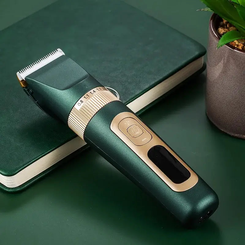 Electric hair trimmer or clipper with a dark green body and gold accents.